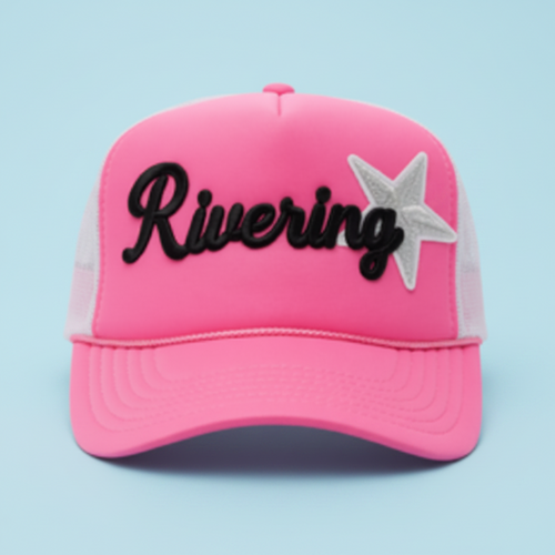 Pink cap with 'Rivering' text on a screen with SuperGrok app interface.